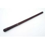 A hardwood swagger swordstick, overall 50cm, blade length 27cm.