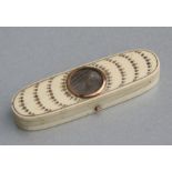 A Regency ivory toothpick box with yellow metal decoration and yellow metal mounted circular hair