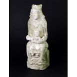 A weathered carved limestone figure of a seated Madonna and Child, 35cms high.