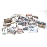 A quantity of British and continental postcards to include topographical scenes.