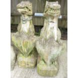 ARCHITECTURAL SALVAGE - PAIR OF RECONSTITUTED STONE STATUES OF MYTHICAL CREATURES HOLDING SHIELDS