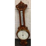 WALL BAROMETER BY A.FURTWANGLER, IN DECORATIVELY CARVED OAK CASE