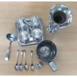 A SMALL COLLECTION OF ELECTROPLATE, COMPRISING AN EGG CUP WAITER WITH SPOONS, A BOTTLE SLEEVE, A BUD