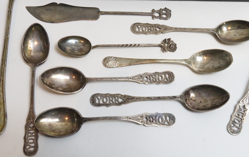 A set of six silver souvenir spoons, pierced with York to the finial; a silver tea spoon; a - Image 3 of 4