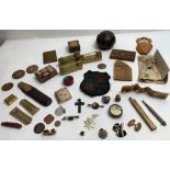 A collection of curios and collectables including cufflinks, badges, medals and other items