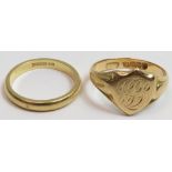 An 18 carat gold signet ring; with a 18 carat gold plain wedding ring; 8g gross