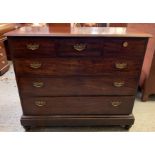 A Victorian mahogany chest with three short and three long graduated drawers, with ornate brass