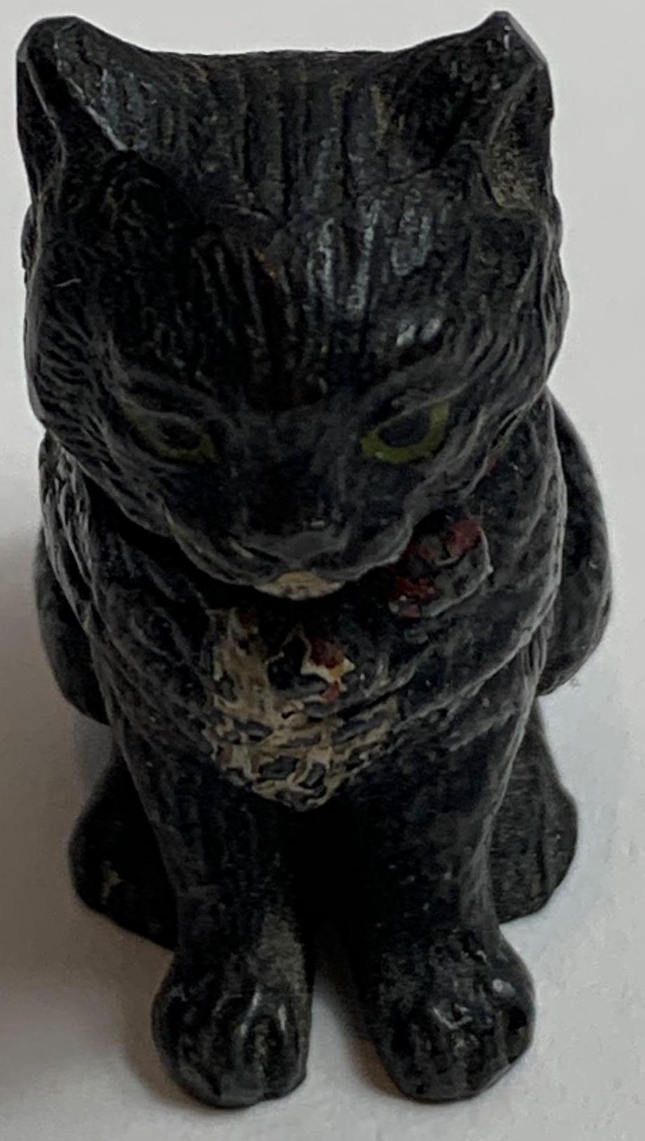 A 20th century cold painted bronze of a cat in the style Franz Bergman