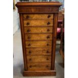 A 19th century walnut Wellington chest, the top with a moulded edge, above an arrangement of eight