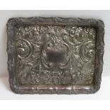 An Edwardian silver dressing table tray, makers mark indistinct, possibly overstruck, Birmingham