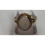 A 9 carat gold opal dress ring, finger size K, 3.3g gross