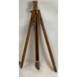 A large 20th century Windsor & Newton beech wood artists easel, 203cm high