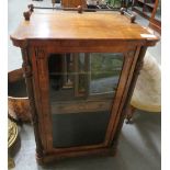 A Victorian decorative inlaid walnut veneer music cabinet, the top with part metal bar gallery,