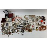 A large quantity of costume jewellery, including: beads, a row of branch coral; paste jewellery;