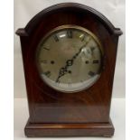 A continental (possibly German) arched mahogany cased mantle clock, with three train movement and