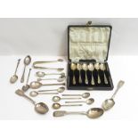 A collection of silver flatware, including a cased set of six silver coffee spoons; a seal end