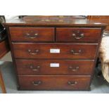 A Victorian mahogany chest of two short and three long drawers, with brass swing handles and