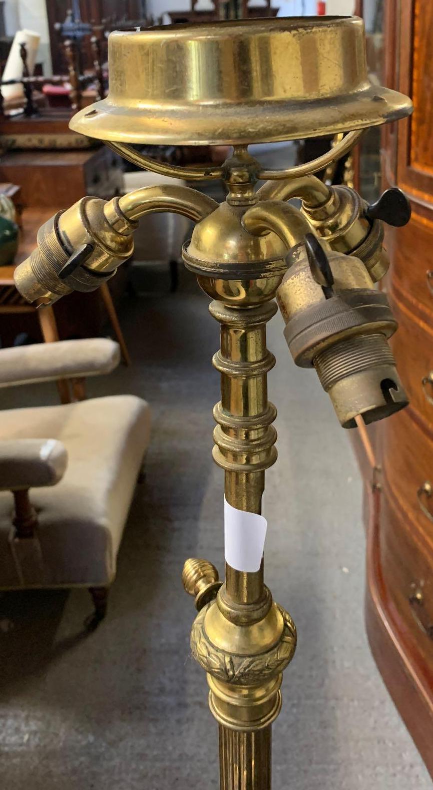 A Victorian brass standard lamp, with a reeded stem support, the circular base with laurel leaf - Image 4 of 4