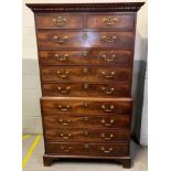 A 19th century walnut chest on chest of two short and eight long drawers on shaped bracket feet,