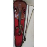 Uncased students violin and a poor quality violin in part of case with 2 bows