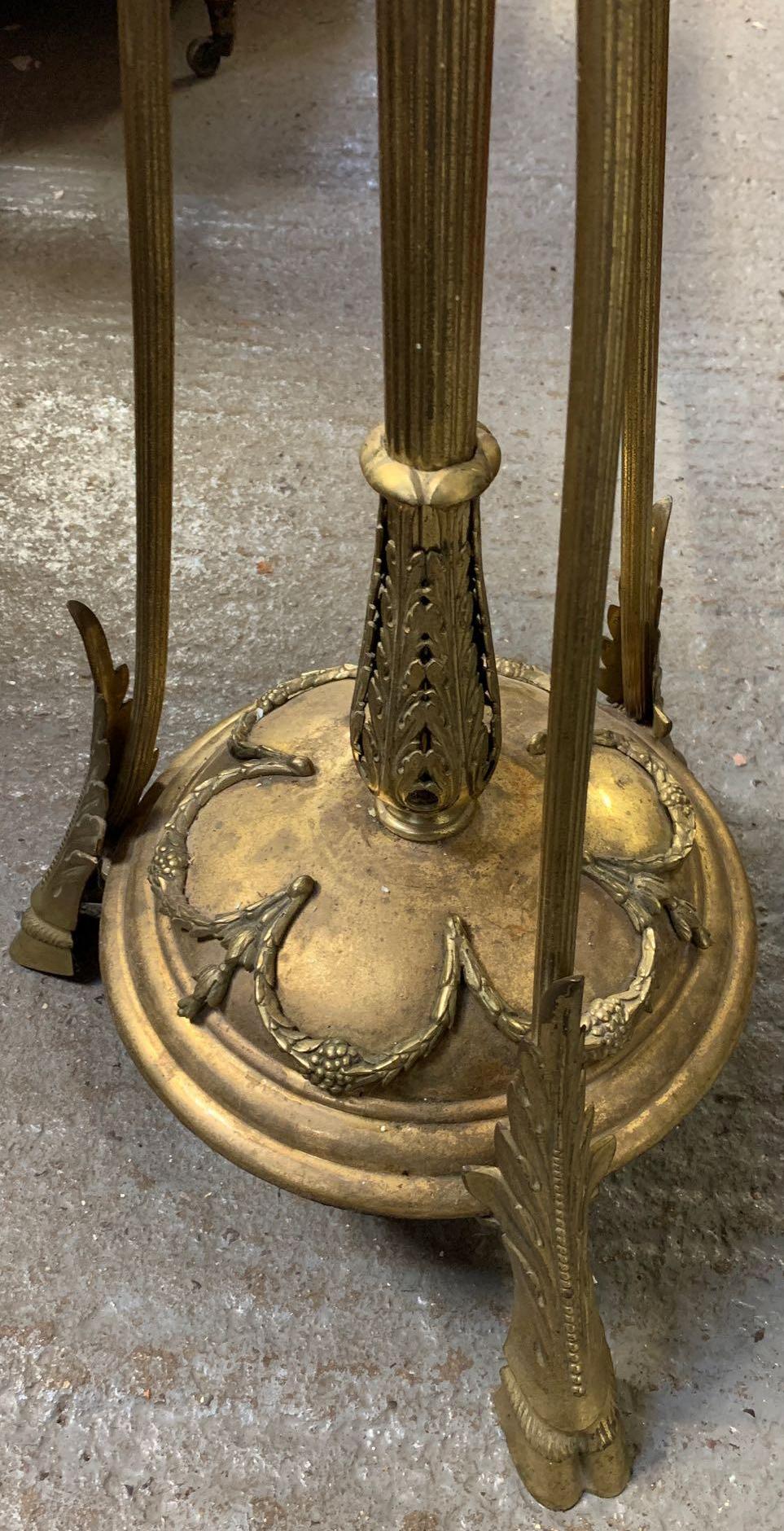 A Victorian brass standard lamp, with a reeded stem support, the circular base with laurel leaf - Image 3 of 4