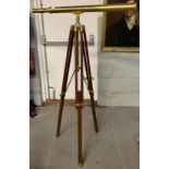Modern brass telescope on mahogany tripod stand