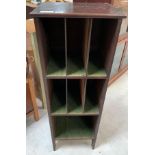 A 20th century mahogany unit of pigeon holes, the