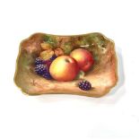 A small Royal Worcester pin dish painted with frui