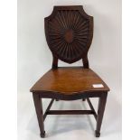 A Victorian mahogany hall chair, the shield shaped