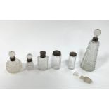 Three silver topped dressing table bottles, three