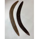 Two wooden boomerangs, of usual form, both approxi