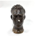 A plaster bust with bronzed finish of J. M. Vernon