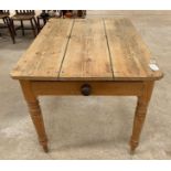 A Victorian pine kitchen table, the three-plank to