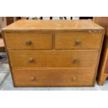 A light oak mid-20th century chest of two short an