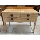 A 20th century stripped pine sideboard, with raise