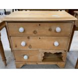 A Victorian pine chest of two long and one short d