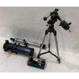 A Celestron AstroMaster 130 telescope together wit
