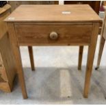 A 20th century pine side table with single long dr