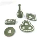 Five Wedgwood green jasperware items including pin