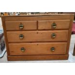A light oak and stained pine chest of two short an