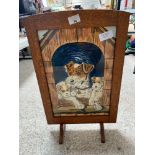 Vintage oak fire screen with picture of dogs.