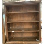 Stained oak open bookshelf. Viewing/collection at West Woodlands