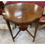 Edwardian inlaid occasional table on casters.