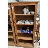 Modern pine bookshelf with adjustable shelves.