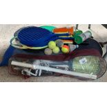Quantity of tennis & badminton rackets along with
