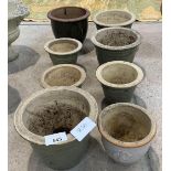 8 decorative round glazed pots.