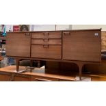 A Meredew teak sideboard fitted with cupboards and