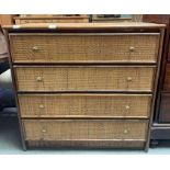 A bamboo and woven cane chest of four long drawers