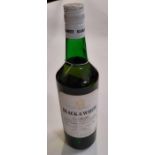 A bottle of Buchanan's Black and White whisky