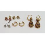 **WITHDRAWN** A collection of five pairs of stone set earrings,